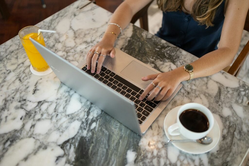 a woman using a laptop