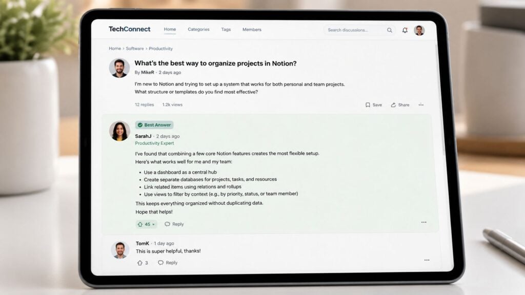 A digital tablet displaying an online forum discussion about project organization tips on the TechConnect platform.